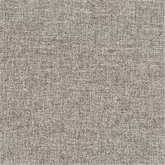 an upholstered gray fabric textured with small dots