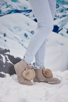 Snuggly and stylish, these SMAIBULUN Ugg boots are the perfect addition to your winter wardrobe. With a chic suede exterior and adorably fluffy faux fur balls, your feet will stay warm and fashionable no matter the temperature. Say goodbye to boring boots and hello to cozy cuteness! 1'' heel 4.6'' shaft 13.2'' circumference Pull-on Leather Suede upper Faux fur lining Rubber sole Beige Sheepskin Boots For Winter, Beige Sheepskin Winter Boots, Faux Fur Trim Round Toe Boots, Winter Suede Boots With Faux Fur Trim, Fluffy Casual Winter Boots, Casual Suede Boots With Faux Fur Trim, Casual Fluffy Winter Boots, Winter Suede Boots With Faux Fur Lining, Reindeer Headband