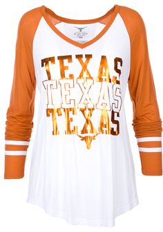 Display your Texas Longhorns spirit in this Texas Burnt Orange T-Shirt! This Texas Hera Long Sleeve T-Shirt makes a great layer for cooler nights cheering on the Longhorns. Featuring a screen print foil graphic on center front, this Texas Longhorns Long Sleeve LS Tee is a must-have for any fan. Hook Em Horns! Relaxed fit, Drapey V neck, Self-fabric sleeve stripes, Screen print team graphic, 90% COTTON / 10% POLYESTER Collegiate Striped Tops With Team Name, White Sports Fan Top For Fall, White Tops For Fall Sports Fans, Collegiate Team-colored Tops With Contrast Stripes, Three Stripes Tops For Team Spirit Fan Gear, White V-neck Tops With Contrast Stripes, Collegiate Striped Tops For Game Day, Striped Collegiate Tops For Game Day, White Long Sleeve T-shirt With Striped Sleeves