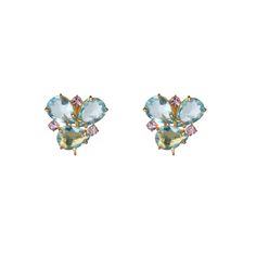 The Nina Earrings are a testament to exquisite craftsmanship, crafted from an array of semi-precious stones in a stunning and harmonious color palette. Their cluster stud design exudes a sense of opulence and charm. What sets these earrings apart is the captivating cat's eye removable drop, adding a touch of uniqueness and sophistication. Blue Topaz Multi-stone Earrings, Fine Jewelry Blue Topaz Earrings With Gemstone Accents, Multi-stone Blue Topaz Earrings As Gift, Elegant Blue Earrings With Stones, Elegant Blue Stone Earrings, Anniversary Blue Topaz Multi-stone Earrings, Anniversary Multi-stone Blue Topaz Earrings, Elegant Sapphire Multi-stone Earrings, Blue Multi-stone Earrings For Jewelry Making