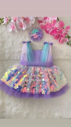 Hello☺️Our dresses are handmade products.Personalized design is available🌸you can let me know by sending a message.Our dresses use cotton lining and have a hidden zipper at the back.Dense layers of tulle are used on the skirts of our dresses and they are fluffy dresses,A hair accessory is also sent as a gift along with the dress🎁We deliver your order within 4 business days with fast shipping💖Thank you for choosing us and we wish you pleasant shopping.⭐️⭐️⭐️⭐️⭐️ Playful Sequin Party Dresses, Playful Sequined Party Dress, Playful Party Dress With Sequins, Purple Mermaid Tutu Dress For Dress-up, Purple Princess Dress With Sequins, Princess Style Purple Sequin Dress, Purple Sequined Princess Dress, Cute Multicolor Dresses For Wedding, Purple Princess-style Mermaid Dress In Tulle