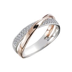 two tone gold and silver ring with diamonds on the sides, set against a white background