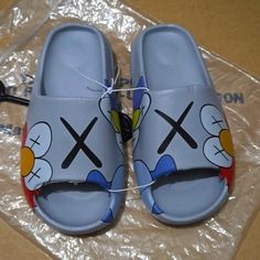 Men's Grey Cartoon Cloud Slide Sandals Men's Funky Cartoon Print Open-Toed Grey Cloud Sandals For Daily Casual Style & Movement. Nwt Blue Non-slip Casual Slippers, Casual Blue Flat Slippers, Casual Light Blue Slip-on Slippers, Blue Casual Outdoor Slippers, Casual Gray Slippers, Light Blue Flat Casual Slides, Casual Gray Flat Slippers, Casual Light Blue Flat Slides, Casual Gray Open Toe Slides