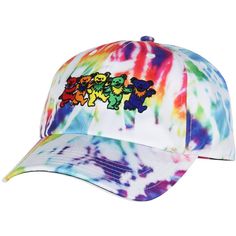 The Grateful Dead adjustable snapback adult hat is a vibrant and nostalgic piece that celebrates the counterfunure band. This eye-catching hat features a classic tie-dye pattern, blending bold, swirling colors reminiscent of the 1960s psychedelic era. Adorning the front is an intricate, embroidered depiction of the Dancing Bears, a beloved symbol from the Grateful Dead's visual repertoire, rendered in vivid hues that pop against the tie-dye backdrop. The snapback design ensures a customizable fi Playful Multicolor Snapback Hats, Novelty Multicolor Snapback Hat, Multicolor Hippie Cap, Grateful Dead Dancing Bears, Bill Walton Grateful Dead, Running Hats, Dancing Bears, Wool Fedora, Scarf Hat