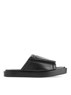 Slide-in sandals with chunky sole and square-shaped toe. The padded upper is made of leather and features a hook-and-loop closure. The leather used has undergone a chrome-free tanning process. Rubber sole. Slides Black Women, Black Sandals Flat, Trainer Boots, Slide In, Leather Slides, Shoes Trainers, Tanning, Dresses With Leggings, Flat Sandals