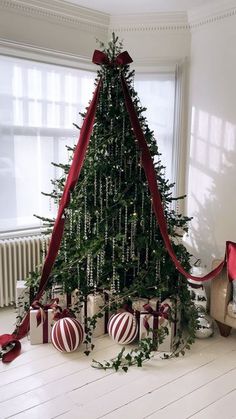 a decorated christmas tree in a living room