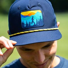 Hit the trails with our Trail Runner Rope Hat, highlighting the rugged and adventurous spirit of trail running. This hat seamlessly combines style and practicality, offering a unique and dynamic choice for trail runners who want to showcase their love for off-road adventures. Elevate your trail running gear with this exceptional accessory that adds a touch of wilderness to your ensemble and makes for an outstanding gift! Adjustable Fit Snapback Hat With Flat Bill For Outdoor, Casual Breathable Hats For Outdoor Activities, Breathable Snapback Hat For Outdoor Activities, Functional Breathable Snapback Hat For Outdoors, Adjustable Fit Snapback Hats For Outdoor Activities, Breathable Adjustable Hats For Outdoor Activities, Breathable Adjustable Hats For Outdoor, Adjustable Moisture-wicking Hats For Outdoor Activities, Outdoor Snapback Trucker Hat With Moisture-wicking