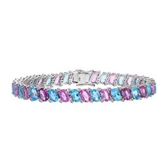 Blue topaz pink sapphire diamond tennis bracelet 18k white gold jewelry / Pink & blue gemstone bracelet for her / Elegant jewelry for women STONE DETAILS : ❋ Stone : Blue Topaz & Pink Sapphire ❋ Stone Size : 4X6 MM Approx. (± 0.20 MM) ❋ Stone Shape : Oval Cut ❋ Stone Weight : 9.14 & 10.02 Cts. Approx. ❋ Stone Type : Natural ❋ Diamond Weight : 0.90 Cts. Approx. ❋ Diamond Shape : Round Cut ❋ Diamond Color & Quality : HI- Slightly Included ❋ Diamond Type : Natural METAL DETAILS : ❋ Metal Purity : Solid 18K Gold  ❋ Metal Color : White Gold ❋ Bracelet Length : 6.50 Inches Approx. ❋ Gross Weight : 18.980 Gms. Approx. ❋ Gold Net Weight : 14.968 Gms. Approx. ❋ Making : Handmade ❋ Style Code : BR-0186 ------------------------------------- Note: For more products visit my shop through by below link: Silver Multi-stone Tennis Bracelet, Fine Jewelry White Gold Diamond Bracelet With Gemstones, Gemstone Accented Fine Jewelry Tennis Bracelet, Sterling Silver Gemstone Tennis Bracelet, Sapphire Tennis Bracelet For Formal Occasions, Fine Jewelry Tennis Bracelet With Gemstone Accents, Multi-stone Tennis Bracelet In Fine Jewelry Style, Formal Fine Jewelry Tennis Bracelet With Gemstone Accents, Elegant Blue Multi-stone Bracelets