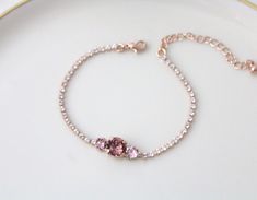 Our delicate rose gold bridal bracelet can be customized with your wedding colors. - Handmade to order with CRYSTALLIZED™ - Swarovski Elements - Swarovski blush rose, vintage rose and clear stones - Rose gold plated brass - Available in other finishes and Swarovski crystals upon request - 7 inches long and extends to 8 inches. - Each piece is gift wrapped matching pieces: https://www.etsy.com/listing/644577345/dainty-bridal-jewelry-set-bridesmaid?ref=shop_home_active_4&frs=1 Please see Swaro Delicate Pink Bracelets For Wedding, Delicate Pink Bracelet For Wedding, Elegant Pink Gold Bracelets For Wedding, Dainty Rose Gold Bracelets For Wedding, Elegant Pink Gold Wedding Bracelets, Adjustable Pink Gold Wedding Bracelets, Adjustable Pink Gold Wedding Bracelet, Adjustable Pink Gold Bracelets For Wedding, Delicate Rose Gold Bracelets For Bridesmaids