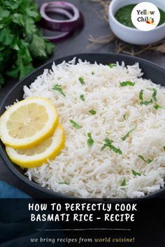 a bowl filled with basmat rice next to sliced lemons and cilantro