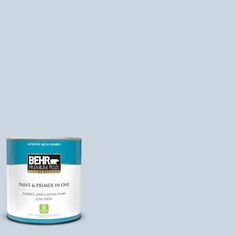 the behr paint is light gray and it has a green tint on top