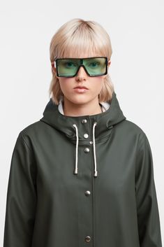 Stay dry and stylish with the green Mosebacke Lightweight Raincoat for women. It's packable, completely waterproof, and features an A-line silhouette. Shop now. Green Raincoat, Raincoats For Women, Rain Wear, Waterproof Fabric, Metal Buttons, Dark Denim, Stockholm, Wardrobe Staples, Parka