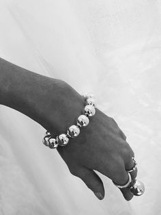 A great and timeless silver bracelet with big balls! The balls are hollow, so the bracelet is not too heavy to wear. Match with Happy ring. Buy genuine silver bracelets in a stylish design from Mila Silver. Free shipping | 2-4 days delivery | 30 days free purchase