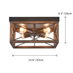 an image of a ceiling light fixture with three lights on each side and measurements for the width