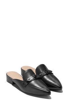 A dainty bow adds a dose of sweetness to a refined mule elongated by a pointy toe. 1" heel Leather upper/synthetic lining/rubber sole Imported Classic Slip-on Mules For Party, Classic Office Heels With Bow Detail, Elegant Flat Mules For Evening, Formal Slip-on Heels With Bow, Classic Pointed Toe Mules For Office, Classic Formal Mules With Pointed Toe, Classic Slip-on Mules For Evening, Classic Low Heel Mules For Office, Classic Flat Heel Mules For Evening