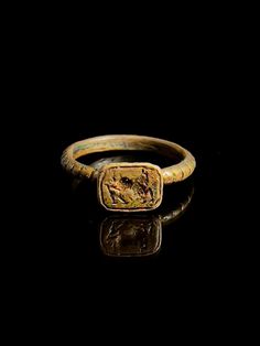 Ancient Ottoman Ring, Seal with Trotting Horse, finely carved bronze, from the post-Medieval era, dating back to the 18th Century AD. MEASURES Diameter: 19.4mm. Weight: 3.05 g. Condition: Good solid and wearable condition. Signs of wear consistent with age and use. See pictures. Certificate of authenticity available upon request (pdf document). This ancient finger ring from the Crusader era is a fascinating artifact that has both historical and aesthetic value. This ring bears traces of a bygone era. The high-quality brass ring reveals exquisite craftsmanship and fine detail work, depicting a trotting horse. These fine details, which literally enclose the symbols, testify to the extraordinary skill and aesthetic sensitivity of the craftsman. The carving decoration served as a stamp or seal Traditional Bronze Rings For Ceremonial Occasions, Antique Open Ring For Ceremonial Occasions, Antique Carved Engraved Ring For Ceremonial Use, Antique Engraved Open Ring For Ceremonial Occasions, Ceremonial Antique Rings With Antique Finish, Antique Brass Rings For Ceremonial Occasion, Antique Carved Signet Ring For Ceremonial Use, Ancient Style Engraved Ceremonial Jewelry, Gold Ancient Style Signet Ring For Ceremonial Use