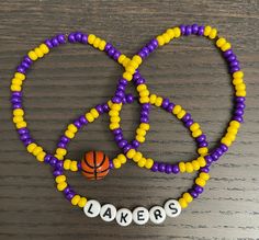 Lakers Bracelet, Cool Beaded Bracelets, Cool Bracelet Ideas, Pulseras Ideas, Basketball Bracelet, Ideas Pulseras, Diy Kandi Bracelets, Clay Bead Necklace, Bracelets Beads