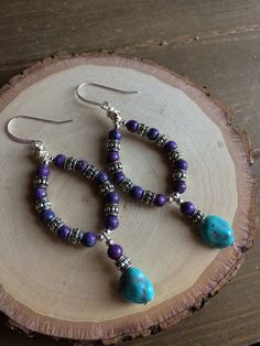 Turquoise earrings boho purple sleeping beauty earrings hoop wire silver dangle handmade stone earrings tribal gift unique jewelry for women Earrings for women. Yes, please. I love to rock a great pair of earrings. Stone, crystal, lampwork, beaded earrings, well I love all of them! These earrings have 4mm purple turquoise, 10mm sleeping beauty natural stone turquoise. Bali beads, Silver wire handmade hoops, Sterling silver ear wires. I haven't been able to get my hands on the real deal for FOUR Bohemian Turquoise Hoop Earrings With Natural Stones, Bohemian Dangle Hoop Earrings With Natural Stones, Bohemian Purple Sterling Silver Earrings, Bohemian Purple Wire Wrapped Jewelry, Bohemian Sterling Silver Wire Wrapped Hoop Earrings, Boho Purple, Beaded Boho Necklace, Lampwork Necklace, Earrings Stone