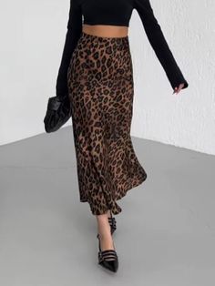 Be stylish and comfortable in our elegant and unique leopard print hip skirt.Made from premium fabric, this skirt is soft and breathable for all-day wear. The unique leopard print on this skirt adds a touch of personality, while the skirt ensures a comfortable wearing experience.Perfect for casual outings, running errands, or just lounging at home, this skirt from LikeMyChoice® effortlessly combines style and comfort. Pair it with your favorite sandals or jewelry for a stylish and effortless loo Outfit Rok, Floral Hair Crown, Drape Maxi Dress, Hip Skirt, Elegant Skirt, Midi Dress Casual, Swimsuit Dress, Effortless Look, Maxi Knit Dress