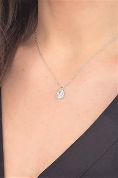 "This Cubic Zirconia Necklace is very elegance and simplicity for Bridesmaids. also It to be perfect necklace any Special day. Silver Teardrop Crystal Bridal Necklace, is perfect for your loved one. A perfect gift for mom, daughter, wife, girlfriend, classmates and friends. A clear choice for Graduation Gift, Mother's Day gift, Valentine's Day gift, a uniquely beautiful necklace that you can treasure forever. Beautifully packaged in our custom designed jewelry box, message card. A complete gift ready package. If you want to combine it with earrings and bracelets, I leave the link here. https://www.etsy.com/uk/listing/1243959614/silver-teardrop-crystal-bridal https://www.etsy.com/uk/listing/1280448125/925-sterling-silver-wedding-bracelet * Handmade with love ♡ * Material: 925 Sterling Silve Diamond Teardrop Necklace, Silver Wedding Bracelet, Zirconia Necklace, Cubic Zirconia Necklace, Necklace Chain Lengths, Necklace Wedding, Bridesmaid Necklace, Teardrop Necklace, Custom Name Necklace