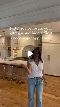 a woman is standing in the middle of a kitchen with an appliance that says pov you renovate your kitchen and hide almost every major appliance