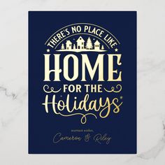 there's no place like home for the holidays card with gold lettering on a blue background