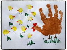 a child's handprint is shown with chickens and chicks in the foreground