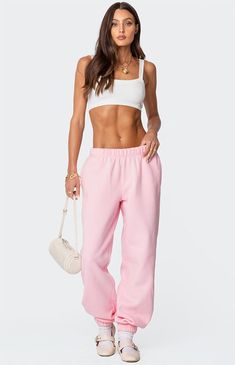 Reach your ultimate level of coziness, while still feeling on-trend with these perfect Clark oversized sweatpants from Edikted.SweatpantsOversized fitCotton, PolyesterModel wears size SModel height is 5'7Item care: Machine wash at maximum 30ºC, do not bleach, do not tumble dry, iron at a maximum of 110ºC, do not dry clean. Edikted Womens Clark Oversized Sweatpants - Pink size Large Pink Comfortable Sweatpants For Loungewear, Trendy Pink Sweatpants For Lounging, Pink Sweatpants With Ribbed Waistband, Pink Relaxed Fit Sweatpants For Lounging, Casual Pink Sweatpants For Loungewear, Spring Basic Relaxed Fit Joggers, Pink Athleisure Sweatpants For Lounging, Sporty Pink Joggers For Lounging, Pink Joggers With Ribbed Waistband For Loungewear