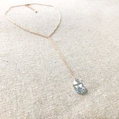 "Heatherly Designs simple Y necklace made with a faceted teardrop Swarovski® crystal and plated brass. The pendant hangs from a 4\" length of chain. Choose your crystal color and metal finish. Shown in French blue and rose gold. ●Nickel free ●Length (adjustable): 16\"-18\" or 40.64-45.72cm ●Drop adds another 4\" or 10.16cm ●Swarovski crystal color(s): Crystal Blue Shade ●Arrives in our signature Heatherly gift box. Handmade with ❤ by Heather ● ● ● ● ● ● ● ● ● ● ● ● ● ● ● ● ● ● ● ● ● ● ● ● ● ● ● Teardrop Lariat Necklace For Wedding, Elegant Teardrop Faceted Crystal Necklaces, Elegant Faceted Teardrop Crystal Necklaces, Elegant Faceted Teardrop Crystal Necklace, Faceted Drop Necklaces For Wedding, Wedding Drop Necklace With Faceted Details, Wedding Drop Crystal Necklaces, Elegant Faceted Teardrop Drop Necklace, Teardrop Faceted Necklace For Wedding