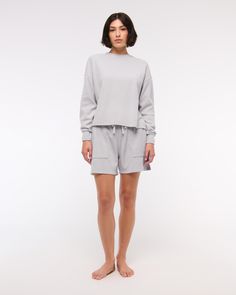 Comfy long-sleeve tee in our softAF fabric and oversized-fit silhouette, featuring an all-over grid micro-waffle texture, crew neckline and straight hem. Gray Relaxed Fit Sweatshirt For Loungewear, Comfy Long Sleeve Spring Tops, Relaxed Long Sleeve Sweatshirt For Loungewear, Comfy Long Sleeve Tops For Spring, Spring Sporty Long Sleeve Top Relaxed Fit, Gray Relaxed Fit Long Sleeve Sweats, Sporty Long Sleeve Top Relaxed Fit For Spring, Sporty Relaxed Fit Tops For Daywear, Sporty Long Sleeve Top For Loungewear