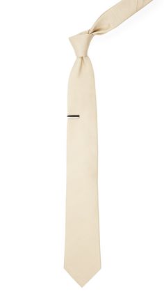 We love the look of neutral colors for your wedding party and champagne neckties stand strong with any suit color. So pop the bubbly! | Men's Tie Bar: Grosgrain Solid Tie - Traditional, In Champagne, Silk Elegant Ties For Groom, Fitted Beige Suit And Tie Accessories For Semi-formal Occasions, Classic Ties For Groom, Elegant Beige Tie For Black Tie Events, Elegant Cream Standard Tie, Elegant Beige Suit And Tie Accessories For Wedding, Elegant Beige Wedding Suit And Tie Accessories, Classic Beige Tie For Weddings, Beige Fitted Tie For Wedding