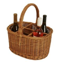 a wicker basket filled with bottles of wine and condiments on a white background