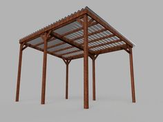 a wooden gazebo sitting on top of a gray ground