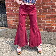 Super flared bell bottom pants in a deep, dark red/maroon color. Comes with front and back pockets. Pant legs seem to have been sewn into cuffs by previous owner. Measurements Waist: 30-32" Hips: 38" Inseam: 30" Rise: 9.5" Leg Opening: 34" Condition: Great; some light distress (See images) Burgundy Wide Leg Bottoms For Fall, Retro Cotton Flares For Fall, Fitted Bottoms With Flared Cuffs For Fall, Fall Fitted Bottoms With Flared Cuffs, Cotton Wide Leg Flares For Fall, Fall Cotton Wide Leg Flares, Fall Wide Leg Flares Made Of Cotton, Vintage Flare Pants For Fall, Maroon Bell Bottom Pants Outfit