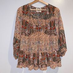 Great Addition To Any Closet. Please Review All Photos. Size: Small Brand: Ppla Clothing Features: Front Neck Tie Balloon Sleeves 3/4 Sleeves Sheer 100% Polyester Ruffle Hem Spring, Summer, Fall Paisley Made In China Hand Wash Pink Base Size: Womens S Condition: New Brand New, Without Tags. Never Been Worn. If There Are Any Flaws, They Will Be Photographed. Bundle 2 Or More Items For A Discount. Fall Patterned Blouse With Boho Print, Red Bohemian Blouse With Paisley Print, Fall Paisley Print Flowy Blouse, Patterned Printed Peasant Top For Fall, Printed Peasant Top For Fall, Printed Peasant Blouse For Fall, Fall Multicolor Paisley Print Blouse, Long Sleeve Flowy Blouse With Paisley Print, Fall Bohemian Paisley Print Blouse