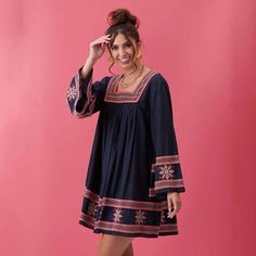 Sometimes you just want to throw on something effortless and casual without skimping on style. Enter the Tess Embroidered Dress! There's two features of this dress that make it the perfect wardrobe piece for conveying effortlessly chic style. The first is the fun yet sophisticated pink embroidery on the square neckline, sleeves and hem that pops against the super soft indigo blue denim. The second is the playful flowy fit that provides comfort while still being feminine and flattering. Sheer per Being Feminine, Dressy Dress, Black Embroidered Dress, Long Kurti Designs, Pink Embroidery, Pink Square, Perfect Wardrobe, Bell Sleeve Dress, Square Necklines