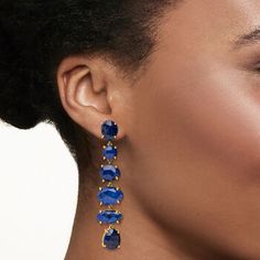 Ross-Simons - 39.40ct t. w. Sapphire Linear Drop Earrings in 18kt Gold Over. These captivating gemstone earrings are bold and beautiful! Featuring impressive linear drops of 39.40 ct. t. w. multi-shaped sapphires set in 18kt yellow gold over sterling silver. Hanging length is 2 1/2". Post/clutch, sapphire linear drop earrings. Sapphire birthstones are the perfect gift for September birthdays. Formal Oval Sapphire Earrings, Blue Oval Earrings For Evening, Party Clip-on Oval Jewelry, Oval Sapphire Earrings With 17 Jewels, Elegant Sapphire Earrings With Polished Finish, Oval Earrings With Prong Setting For Evening, Formal Oval Faceted Earrings, Oval Gemstone Earrings For Evening, Modern Sapphire Earrings For Formal Occasions