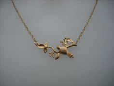 this beautiful necklace is made with matte 16K gold plated bird on a branch connecter hanging on a 16K gold plated chain gold plated chain and clasp can be upgrade to 14K gold filled metal. If you prefer 14K gold filled chain and clasp instead of gold plated one, please order this link with this item! Listing: http://www.etsy.com/listing/81879795/14k-gold-filled-chain thank you Gold Wedding Jewelry With Bird Design, Nature-inspired Gold Leaf Necklace, Tree Branch Necklace, Gold Bird Necklace, Bird Pendant Gold, March Birthstone Necklace, Aquamarine Necklace, Butterfly Necklace, Gold Plated Chains