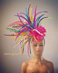 Aimee Fuller Kentucky Derby Fascinator A Lovely, Feathered FRENZY!   Handmade fascinator with a flourish of dazzling feathers. This burst of vibrant colors is fun, elegant, dramatic, and beautiful from all angles, and will have all eyes on you on your special day.    Perfect for the bride, or for your next gala/special event. Easy-to-wear headband fascinator makes a statement and can be worn to a myriad of events: Royal Ascot, Easter, bridal, derby-wear, Del Mar races, hat contests, church, galas, Kentucky Derby, Melbourne Cup, high tea, weddings, cocktail parties, and more. Some customization available; please message with your requests to see if we can meet your needs. *FREE SHIPPING  For more STATEMENT JEWELRY and HANDMADE HATS go to www.aimeesfuller.com Aimee Fuller has been a trusted Pink Headpiece, Carnival Headdress, Cup Hat, Unusual Hats, Headband Fascinator, Kentucky Derby Fascinator, Silly Hats, Derby Outfits, Derby Fascinator