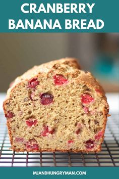 a loaf of cranberry banana bread on a cooling rack