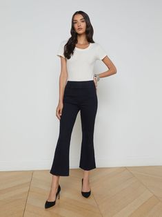 An effortless pull-on jean in super soft stretch denim and a cropped length, now in an ultra dark indigo wash. • Soft stretch denim• High-rise cropped micro bootcut• Center front seaming• Elasticized waistband• No closures | L'AGENCE Kayden Pull-On Kick Flare Pants In Metro Kick Flare Pants, Lace Coat, Flare Pant, Knit Denim, Pull On Jeans, Kick Flares, Dark Indigo, Velvet Lace, Denim Coat