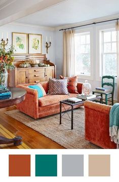 a living room filled with furniture and lots of color in the middle of the room