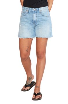 These raw-hem shorts cut from destructed nonstretch denim are styled with a high rise for a comfortable fit perfect for sunny-day adventures. 4 1/2" inseam; 24" leg opening; 12" front rise; 15 1/2" back rise (size 29) 100% organic cotton Machine wash, line dry Imported This product meets Nordstrom Sustainably Sourced Materials criteria: contains at least 50% sustainably sourced materials Faded Cutoff Bottoms With Frayed Hem, Faded Mid-rise Jean Shorts With Frayed Hem, Faded Cutoff Jean Shorts For Summer, Faded Cutoff Ripped Shorts, High Rise Medium Wash Bermuda Shorts With Frayed Hem, Light Wash Bermuda Shorts With Frayed Hem, Relaxed Fit Light Wash Cutoff Bermuda Shorts, Faded Cutoff Jean Shorts With Frayed Hem, Faded Jean Shorts With Frayed Hem And Relaxed Fit