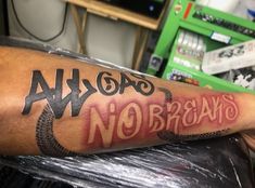 a person with a tattoo on their arm