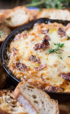 some bread and cheese in a pan on a table