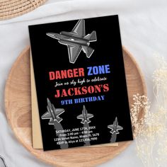 a birthday card with an airplane design on the front and bottom, reads danger zone you're just to celebrate jackson's 9th birthday