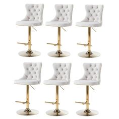 six white and gold barstools with buttons on each one, all in different positions