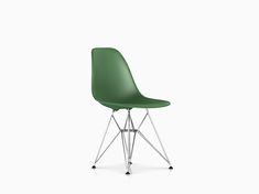 a green plastic chair with chrome legs