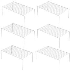 six white wire tables sitting next to each other