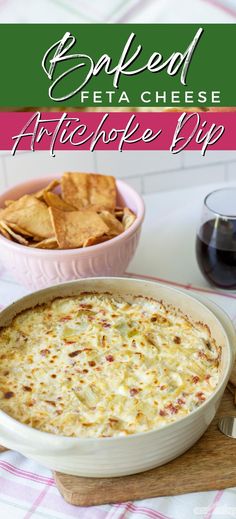 an artichoke dip in a casserole dish with chips on the side